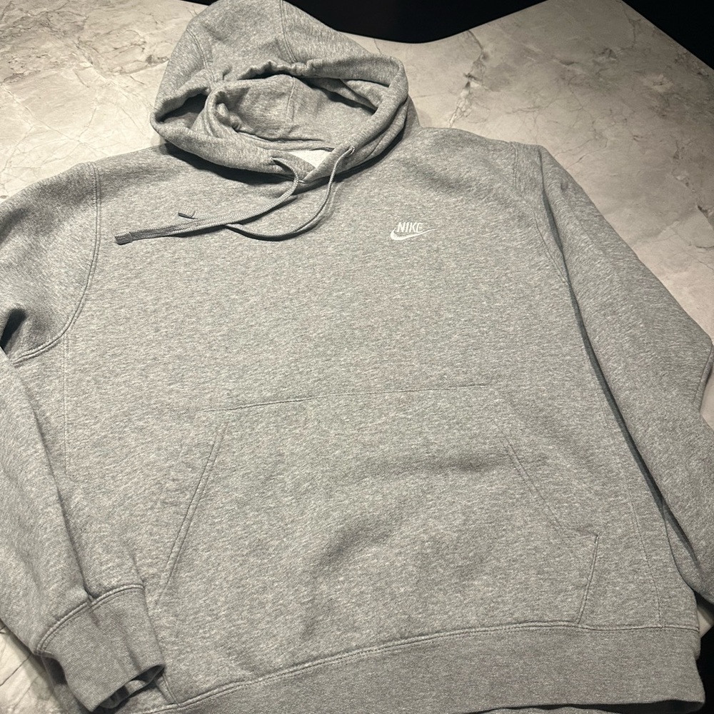 Men’s gray Nike Hoodie.